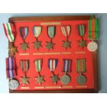 A collection of WWII medals: 1939-1945 Star, Atlantic Star, Aircrew (Europe) Star, Africa Star,