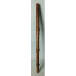 A fruitwood single keyed flute stamped " Cahusac" four times, overall length 61cm, (with two