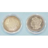 Two USA silver 'Morgan' One-Dollar coins, 1885 and 1900, both O Mint.