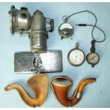 A Joseph Lucas "Calcia Cadet" acetylene gas bicycle lamp, a meerschaum pipe, a pocket voltmeter, a