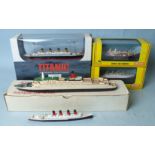 A Claytown Collection Titanic, boxed, with certificate, two boxed Gilbow ships: RMS Britannic and