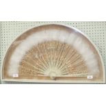 A 19th century fan with painted wood guards and sticks, gauze leaf embroidered in chain stitch,