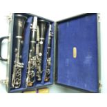 Two Boosey & Hawkes "Edgware" clarinets with spare reeds, in fitted case.