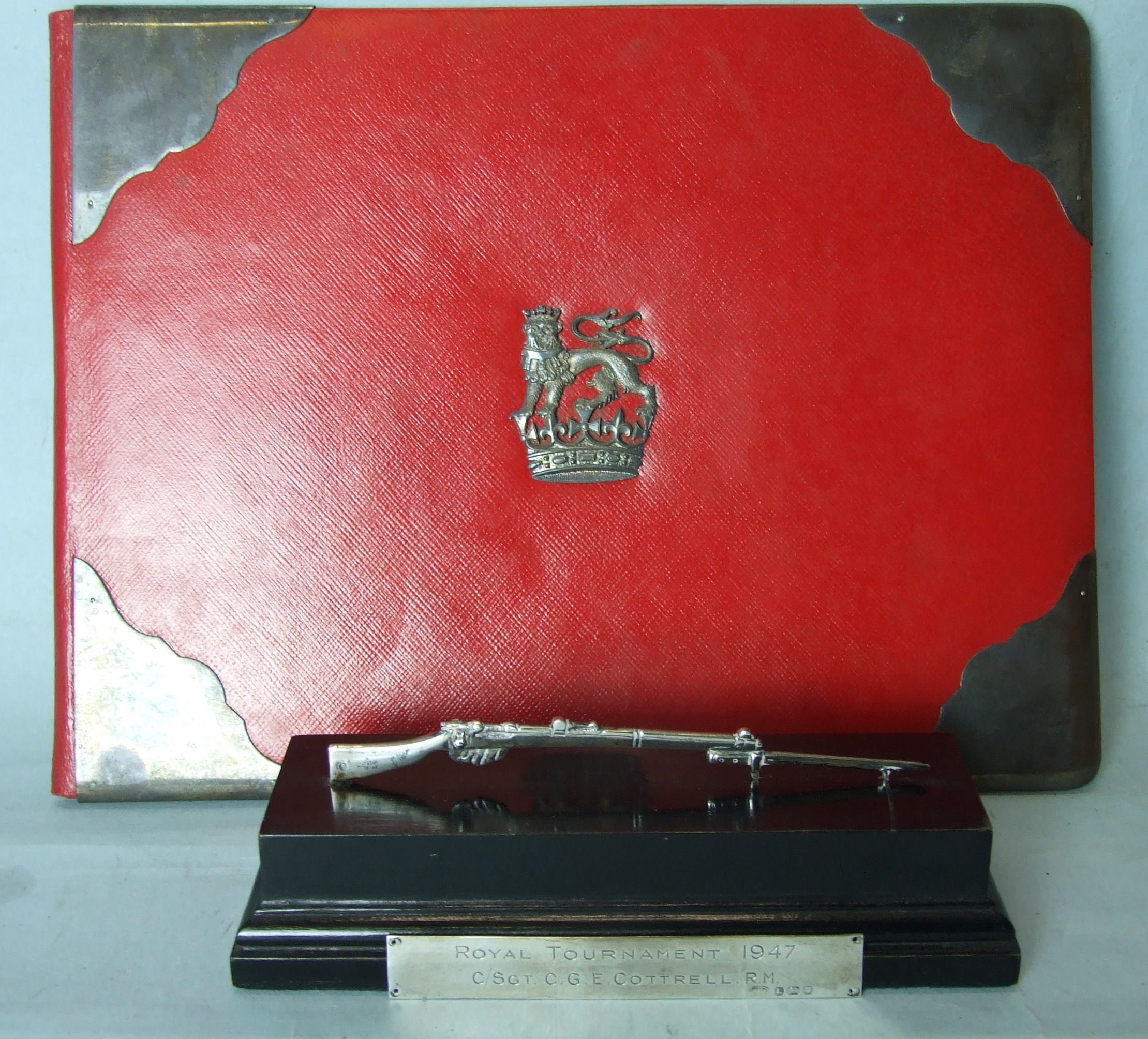 A Royal Tournament 1947 trophy awarded to C/Sgt C G E Cotterell RM in the form of a silver rifle and