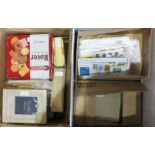 A large accumulation of stamps and covers in four boxes, with first day covers from Great Britain,