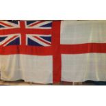 A large white ensign flag, 170 x 364cm and a large Union flag, 140 x 273cm, (2).