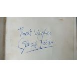 An autograph book with signatures of: Gracie Fields (3), Stanley Holloway, George Formby, Stanley