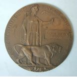 A WWI bronze memorial plaque to Joseph Patrick Dignan.