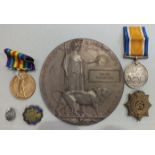 A WWI bronze death plaque awarded to Ralph Thompson, (holed at 12 o'clock), 1914-1918 War medal