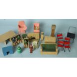 Dolls house furniture, including an Art Deco metal fireplace, clock, settee, chairs, dining table