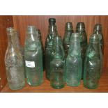 A collection of cod stopper lemonade bottles, including Dartmouth PAW Co, Doble & Son, Tavistock, R.