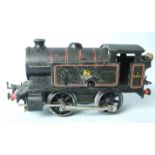 O Gauge, Hornby Type 40 0-2-0 clockwork tank engine, black BR, no.82011 and a scratch-built 5600