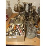 A quantity of plated cutlery, two plated framed perpetual calendars and other plated ware.