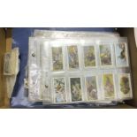 A collection of cigarette cards, including WD & HO Wills 2x 'Railway Engines' 50/50, 'The World's