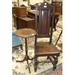 An antique oak hall chair with high back, solid seat and turned front legs, on blocked feet, also an