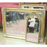 A modern gilt frame hanging wall mirror, 106 x 77cm and two other mirrors, (3).