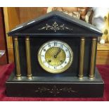 A slate-cased architectural shape striking mantel clock, 28cm high.