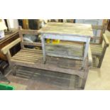 A pair of weathered teak garden benches, 152cm wide and a teak garden table, 76cm wide, (3).