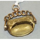 A citrine-set swivel fob with 9ct gold mount of chain design.