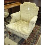 An Edwardian upholstered armchair and a Georgian carver chair, (2).