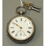 A Late-Victorian silver-cased key-wind pocket watch with white enamel dial, Roman numerals and