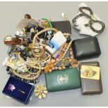 A 9ct gold cross on chain and a quantity of costume jewellery including a pair of boxed Wedgwood