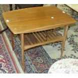 A France & Sons teak occasional table of rectangular form, on tapering shaped legs joined by a