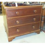 A modern hardwood chest of three drawers, 96cm wide, 85cm high.