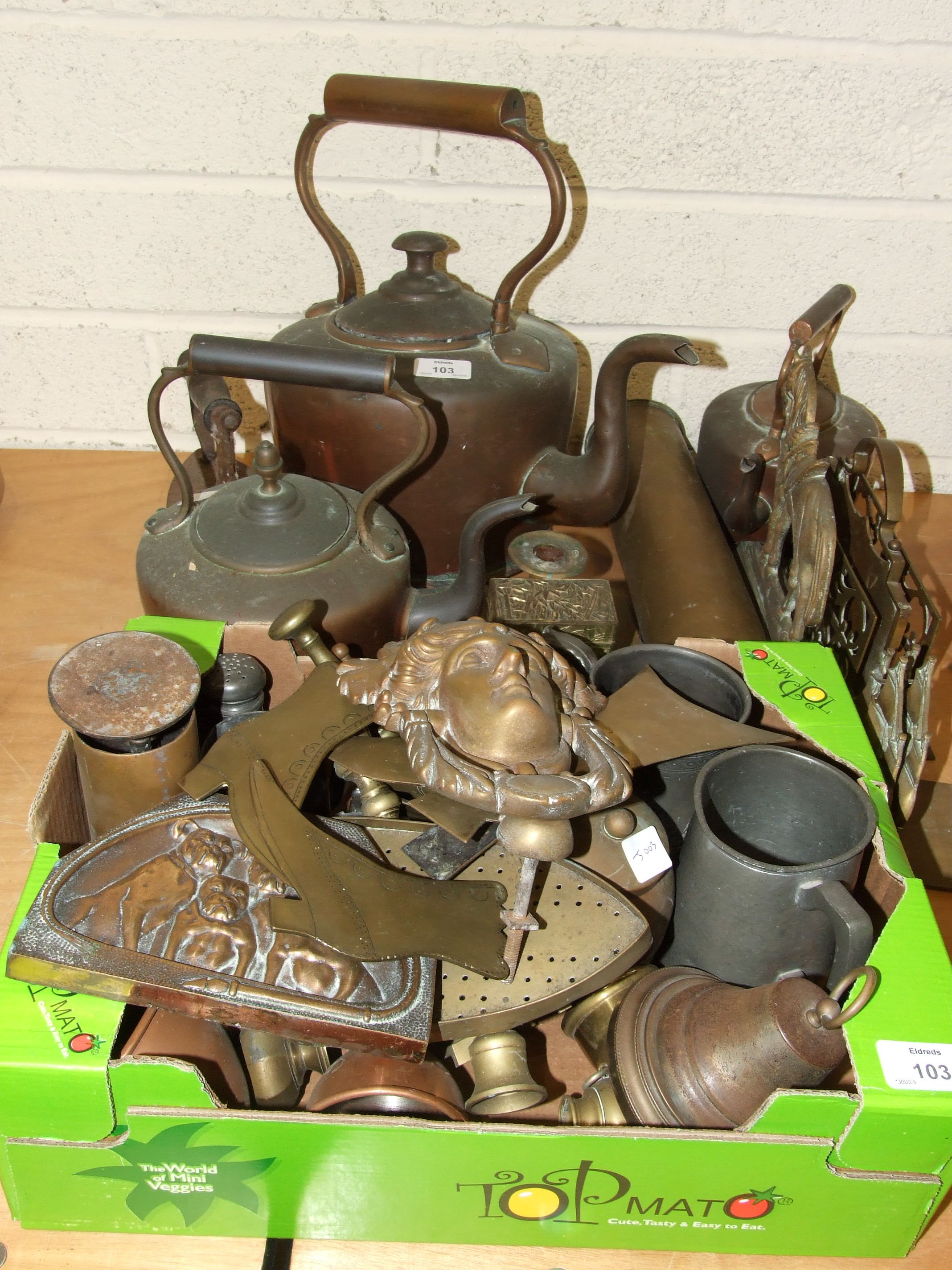 A collection of brass, pewter and copper ware, including kettles, brass shoes, door knocker,