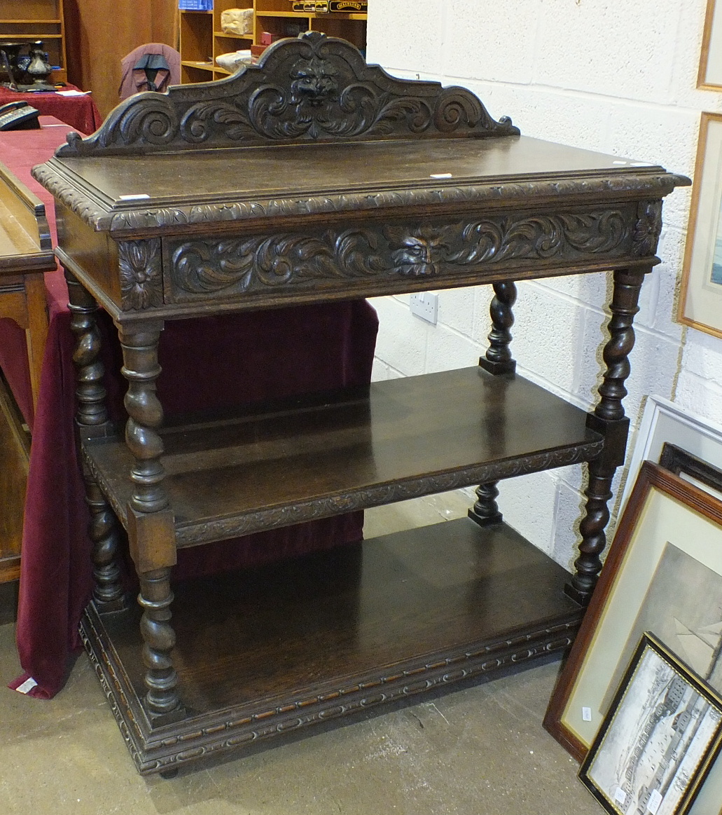 A Victorian carved oak three-tier buffet fitted with frieze drawer, 105cm wide, 107cm high. - Image 2 of 2