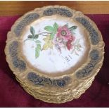 Thirteen Doulton Burslem floral-decorated dessert plates with gilt borders, no.C281, 23cm