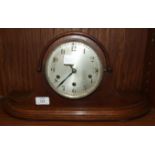 Jughans, Wurtemberg, an oak-cased shaped 'Napoleon's Hat' chiming mantel clock, 23cm high.