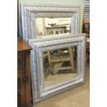 Two silver-painted framed wall mirrors with bevelled plates and a gilt-painted wall mirror, (3).