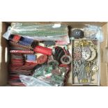 A quantity of Meccano, mainly red, blue and green, including two C/W and one electric motor.