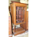 An Edwardian inlaid cross-banded mahogany music cabinet, 48cm wide, 115cm high.