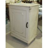 A painted pine low single-door cupboard, 61cm wide, 94cm high, 42cm deep.