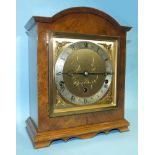 A walnut-cased Elliott Westminster-chiming mantel clock, the dial marked 'Bowden & Sons, Plymouth'.