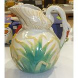 A late-19th century ceramic jug in the form of a Swan, the neck and head forming the handle and