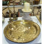 A pair of gilt metal candlesticks, 36cm high, a brass circular Benares tray, 54.5cm diameter and a