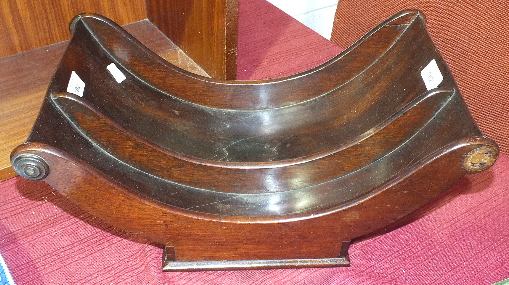 A Georgian-style mahogany two-division cheese coaster, on plinth base, 42.5cm wide, 17cm high.