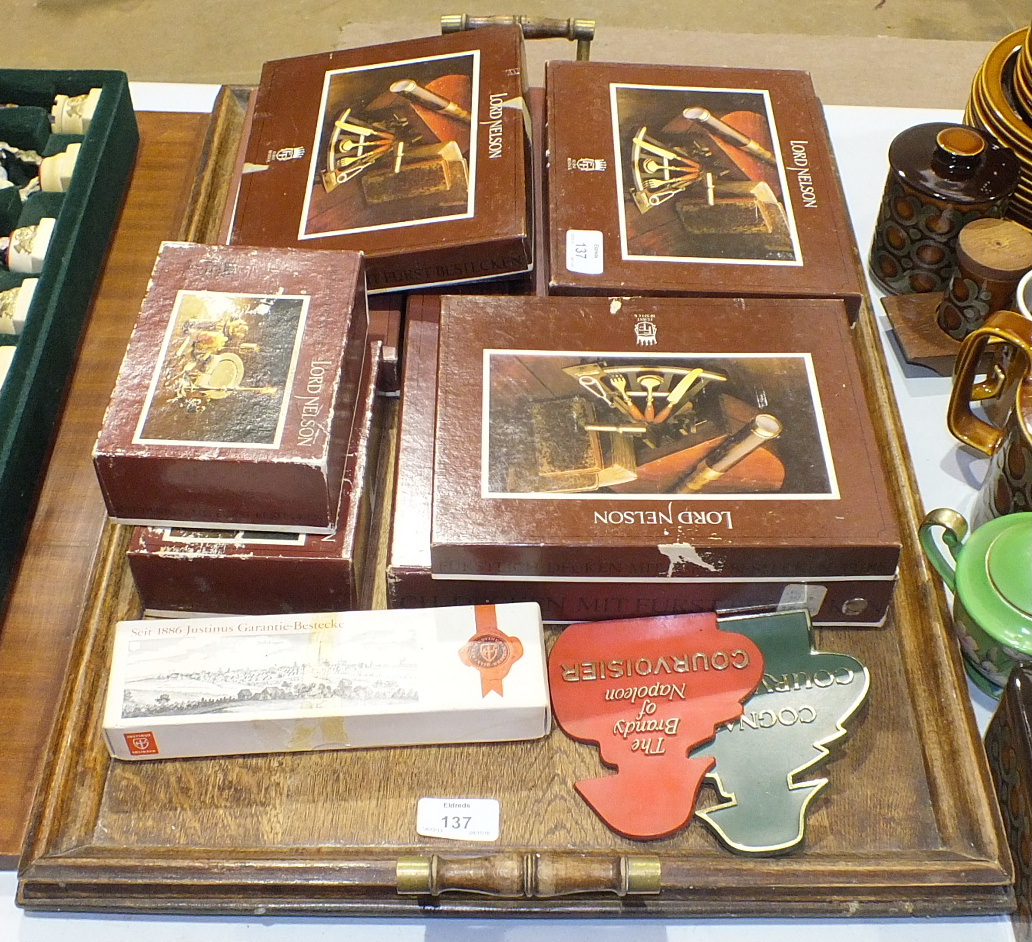 A quantity of Furst Besteck 'Lord Nelson' cutlery and an oak two-handled tray.