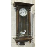 A stained wood case Vienna-style striking wall clock, 70cm high, (a/f).