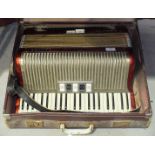 A Hohner Carena IIIM piano accordion, in case.