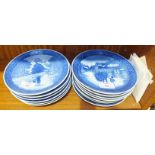 A collection of thirteen Royal Copenhagen blue and white decorated Christmas plates, 18cm