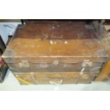 A collection of upholstery leather and suede, leather suitcases, etc.