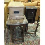 An oak gate-leg table on barley-twist supports, an oak narrow bookcase with glazed door, 31cm