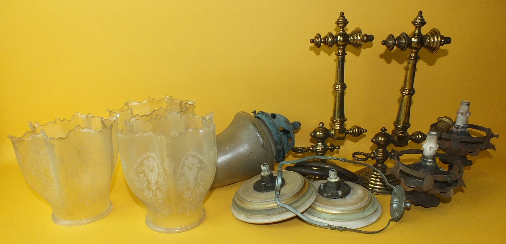 A pair of lacquered brass wall-mounted gas lamps with etched glass shades, (2).