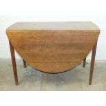An antique oak drop-leaf oval dining table on square tapering legs, 110 x 150cm.
