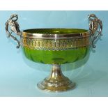 A WMF circular fruit bowl with applied bird cast handles and green glass liner, on circular base,