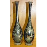 A pair of Meiji cloisonné vases of baluster form with slender tall necks, decorated with an eagle